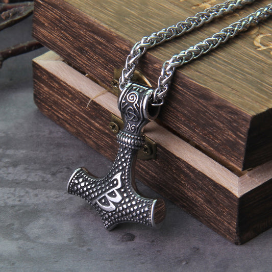 Berkana Rune Mjölnir Amulet with Viking Battleaxe, a powerful symbol of Norse mysticism.