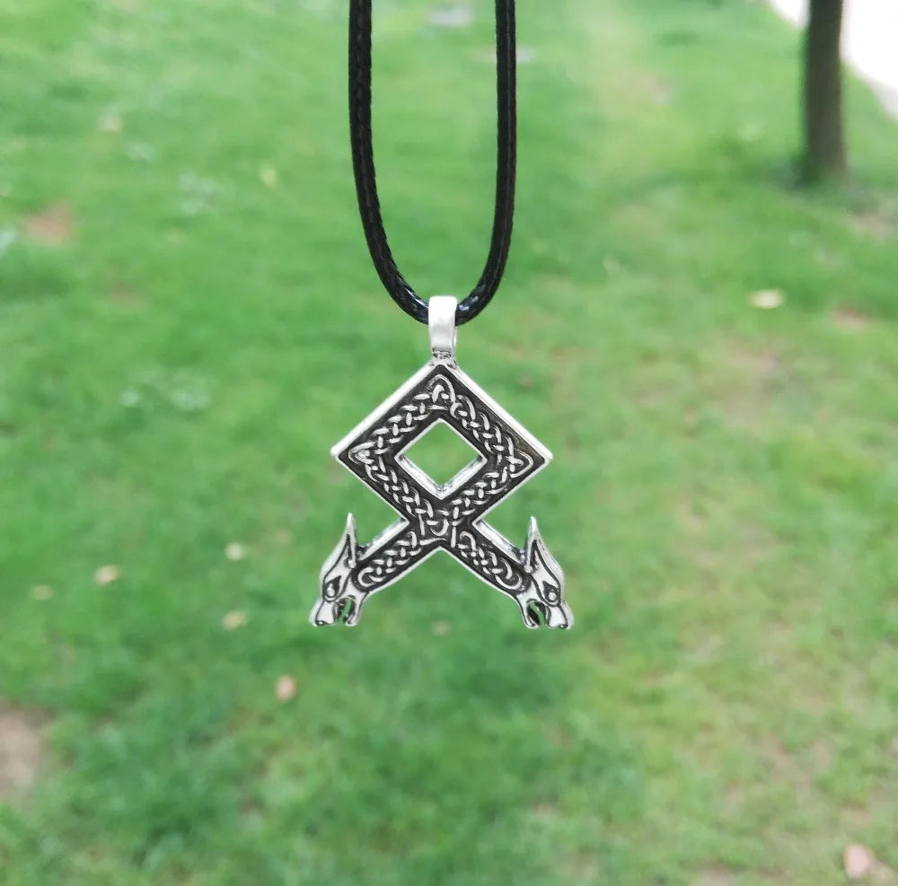 Pendant featuring Othala rune design with Web of Wyrd-inspired details.