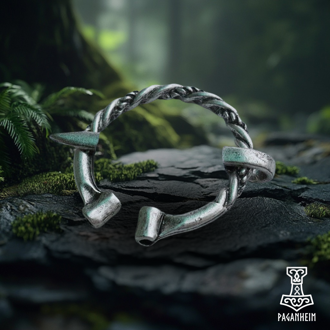 Viking-inspired penannular brooch with a twisted design, available in silver and bronze.