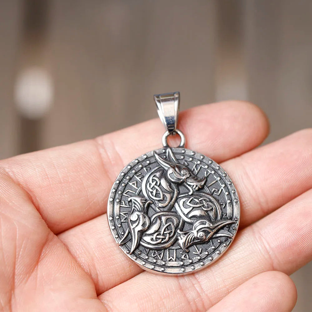 Norse mythology-inspired necklace with shield, dragons, and runes.