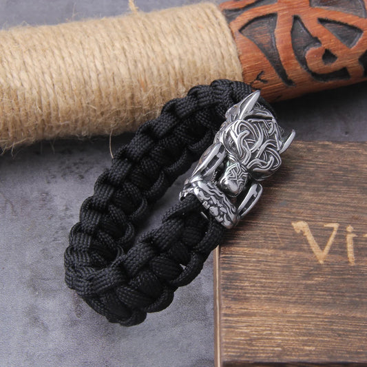 Discover the rugged and stylish appeal of the Paracord Wolf Bracelet, a unique accessory blending durability with modern design.