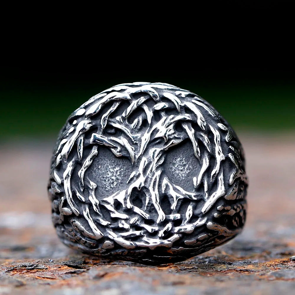 Ring with intricate World Tree design and new growth